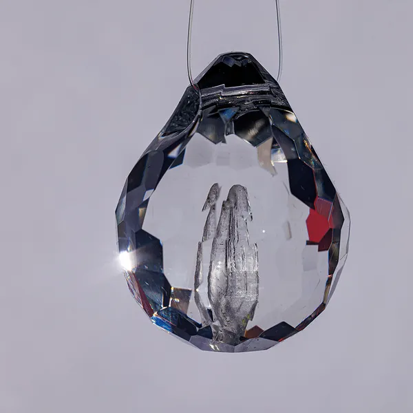 Single faceted glass teardrop pendant