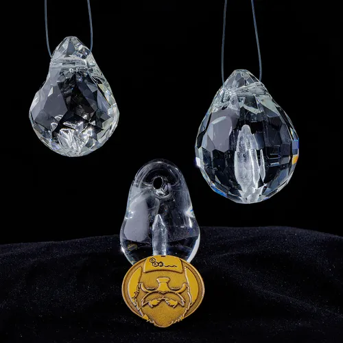 Hanging group of finished cremation pendants