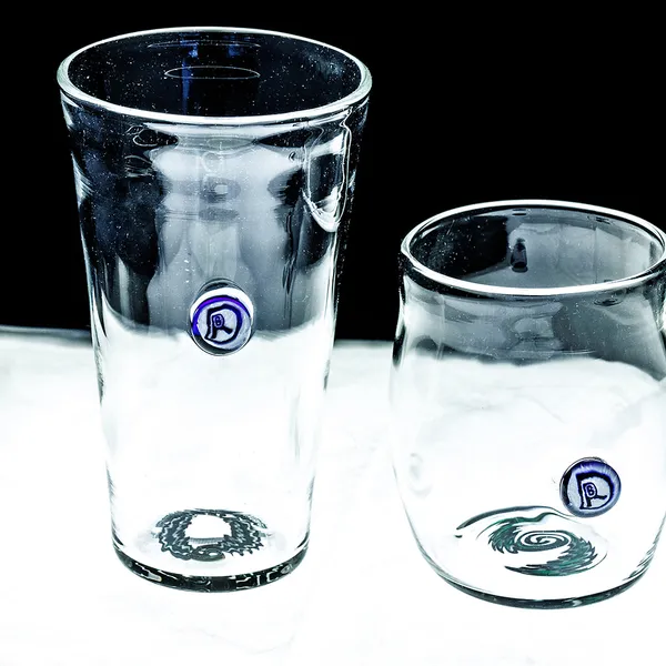 Set of hand-blown glass tumblers showing base signatures