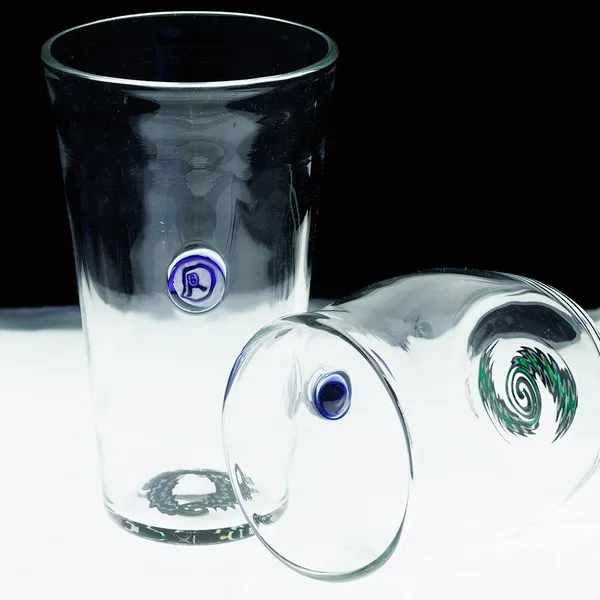 Set of hand-blown glass tumblers showing base signatures